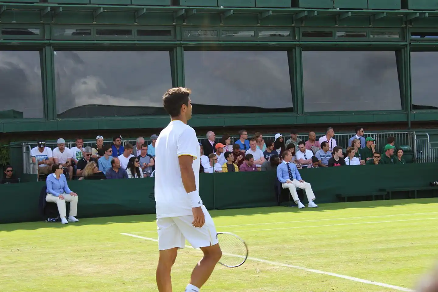 Photo of tennis player on a court